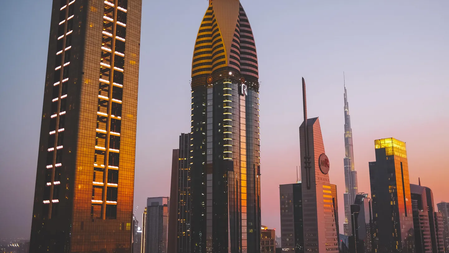 Golden hour sunset over the Burj Khalifa and Dubai Fountain, the iconic starting point for a complete 7 days in Dubai itinerary